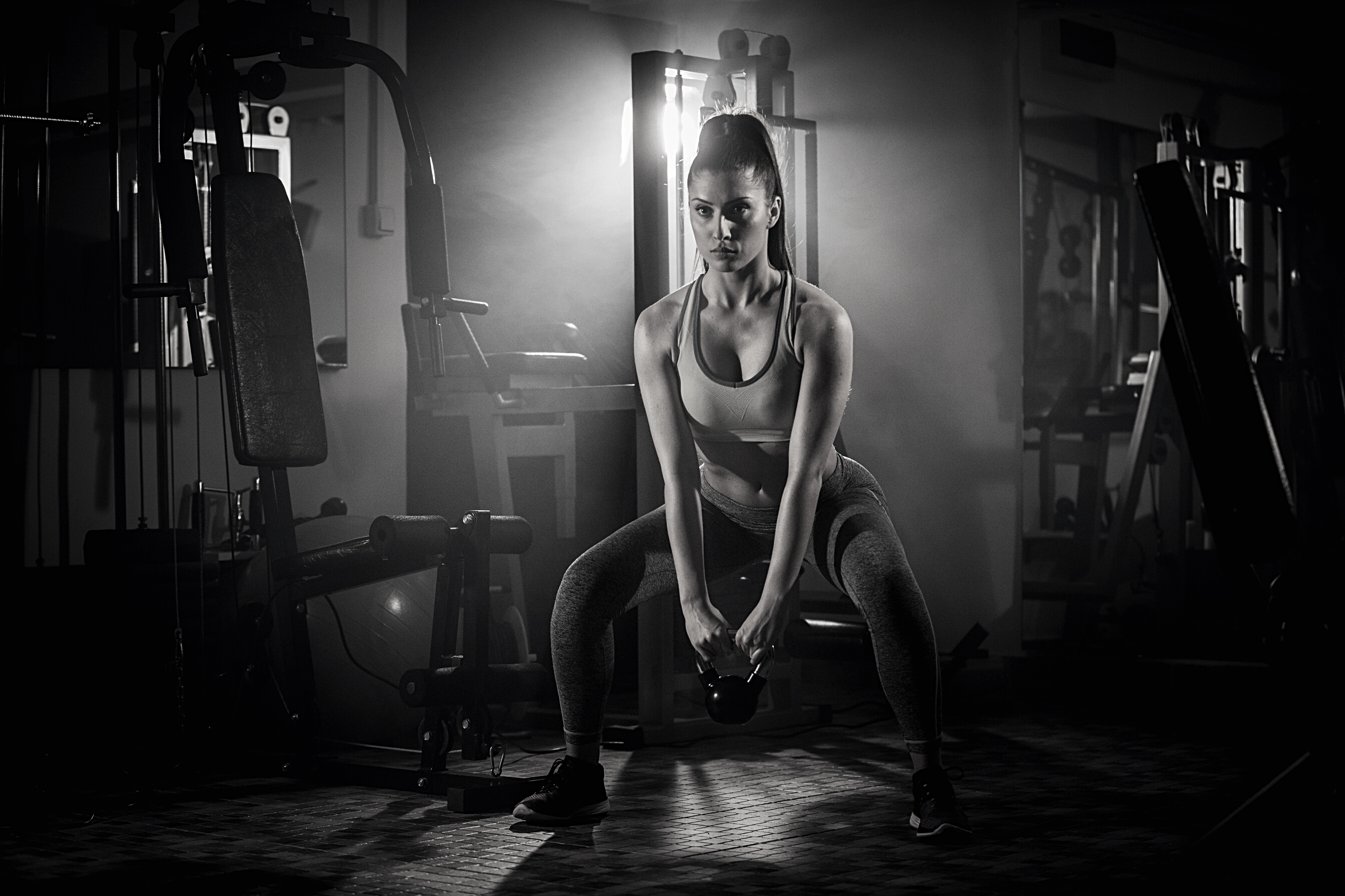Woman training with kettlebell